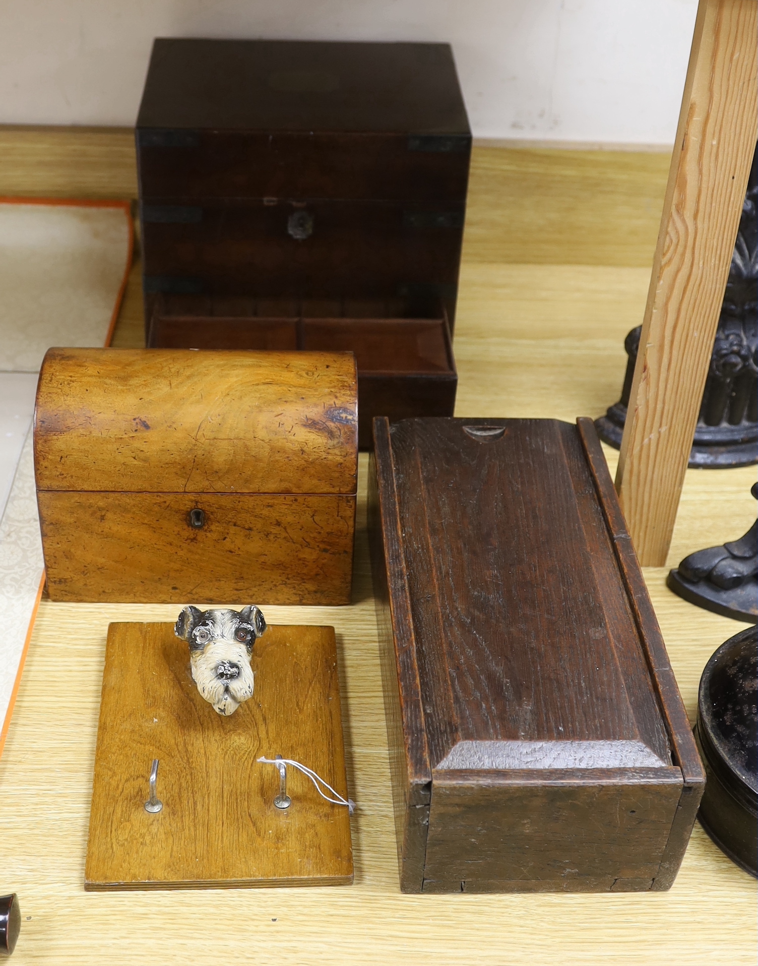A 19th century mahogany brass bound stationary box, a domed tea caddy, an oak candle box and terrier brush stand, stationary box 26cm wide x 23cm high